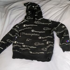 Black and white boys size 6 pull over All over covered logo Champions sweatshirt